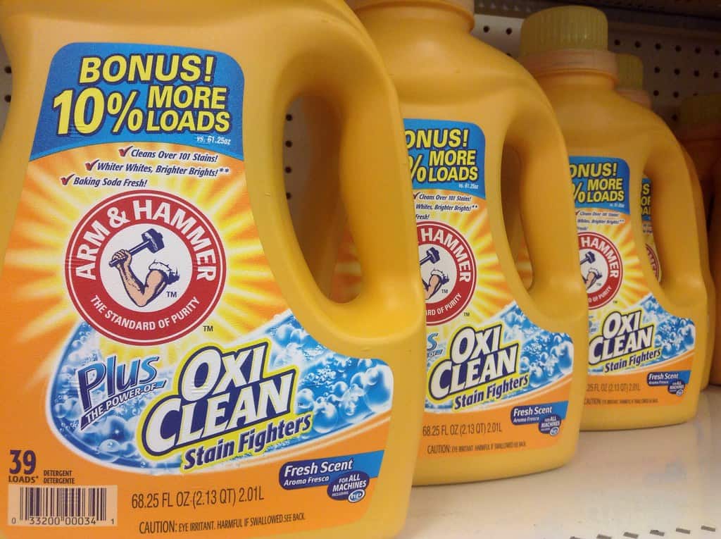 OxiClean stain remover, effective for removing stubborn calcium buildup in rabbit cages.