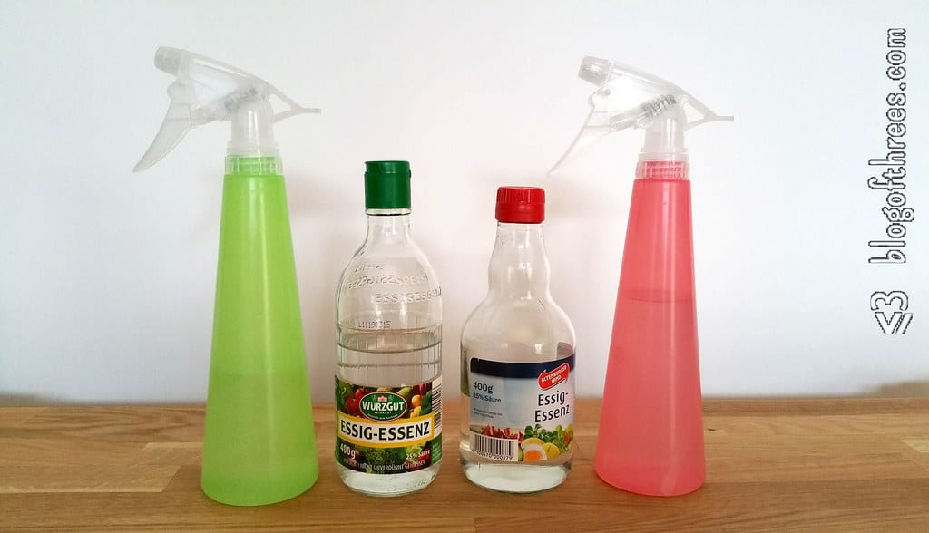 A bottle of vinegar in a spray bottle, the most effective rabbit cage cleaner for urine stains.